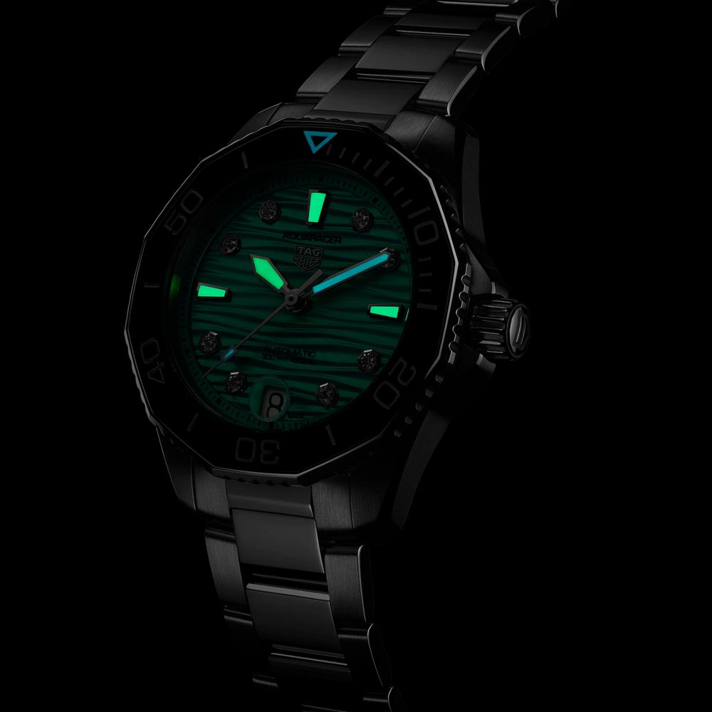 tag heuer aquaracer professional 300 36mm turquoise dial automatic ladies watch in the dark shot