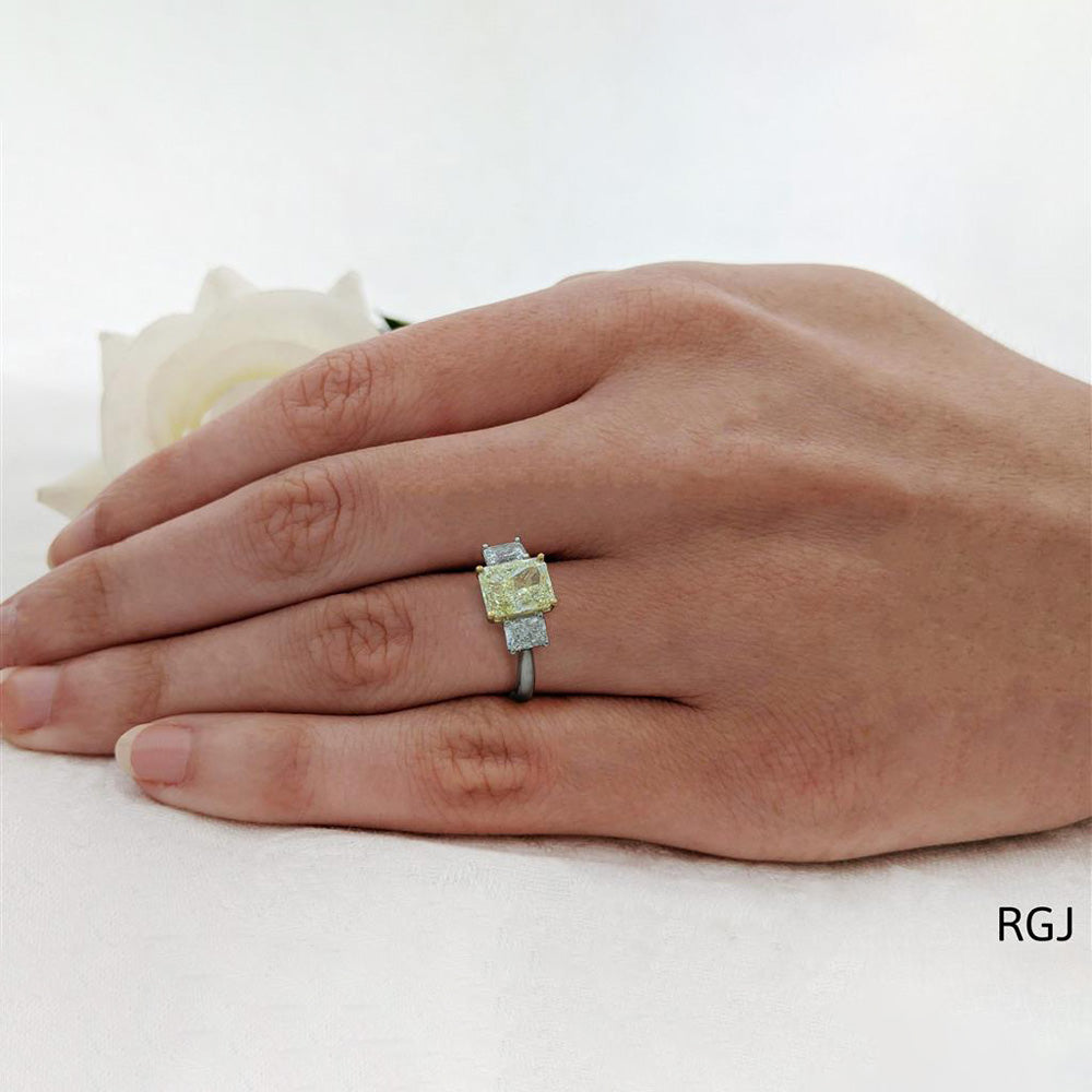 The Florentina Platinum Radiant Cut 2.01ct Yellow Diamond And 1.00ct Diamond Three Stone Engagement Ring