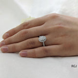 The Skye Platinum 0.72ct Oval Cut Diamond Engagement Ring With 0.35ct Diamond Halo And Diamond Set Shoulders