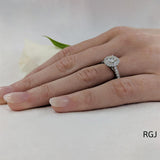 The Skye Platinum 0.40ct Round Brilliant Cut Diamond Engagement Ring With 0.31ct Diamond Halo And Diamond Set Shoulders