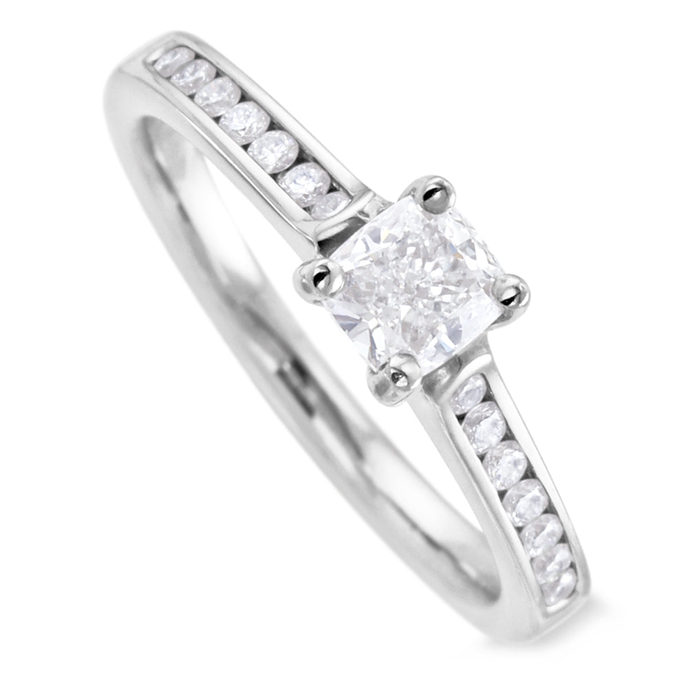 The Waterlily Platinum 0.70ct Cushion Cut Diamond Solitaire Engagement Ring With 0.21ct Diamond Set Shoulders