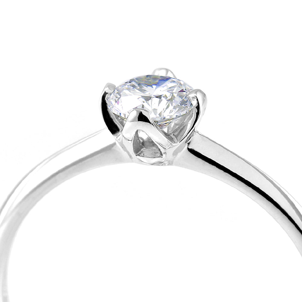 The Lotus Platinum 0.42ct Round Brilliant Cut Diamond Solitaire Engagement Ring