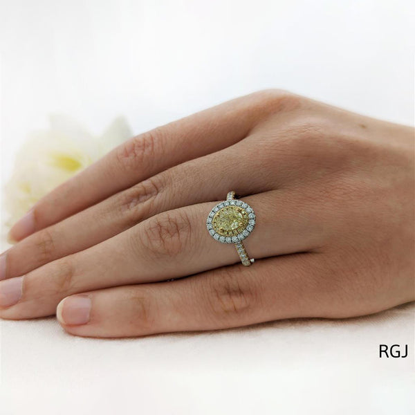 The Skye Duo 18ct Yellow Gold 0.75ct Oval Cut Yellow Diamond Engagement Ring With 0.55ct Yellow And White Diamond Halo And Diamond Set Shoulders