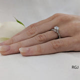The Rona Four Claw Platinum 0.50ct Round Brilliant Cut Diamond Solitaire Engagement Ring With 0.04ct Diamond Detailing