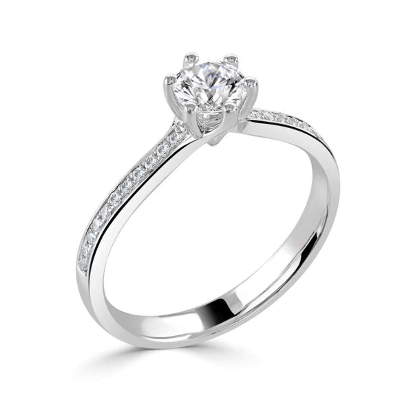 The Orchid Platinum Round Brilliant Cut Diamond Solitaire Engagement Ring With Diamond Set Shoulders