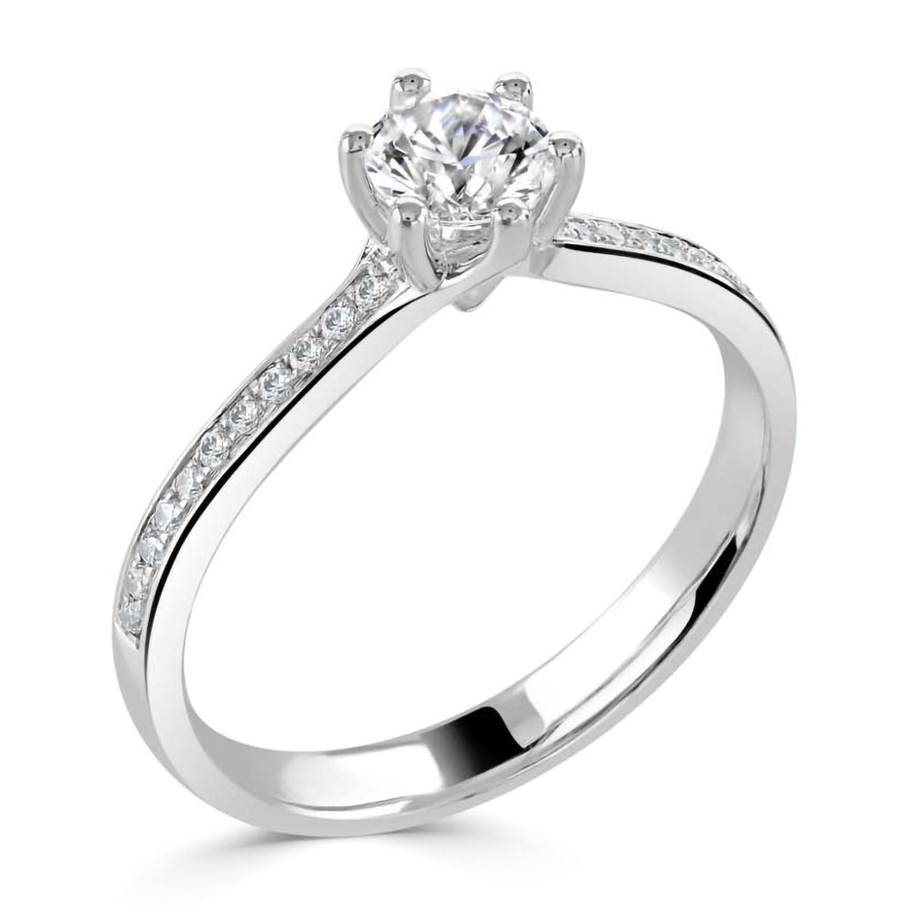 The Orchid Platinum 0.51ct Round Brilliant Cut Diamond Solitaire Engagement Ring With 0.11ct Diamond Set Shoulders