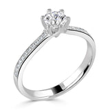 The Orchid Platinum 0.51ct Round Brilliant Cut Diamond Solitaire Engagement Ring With 0.11ct Diamond Set Shoulders