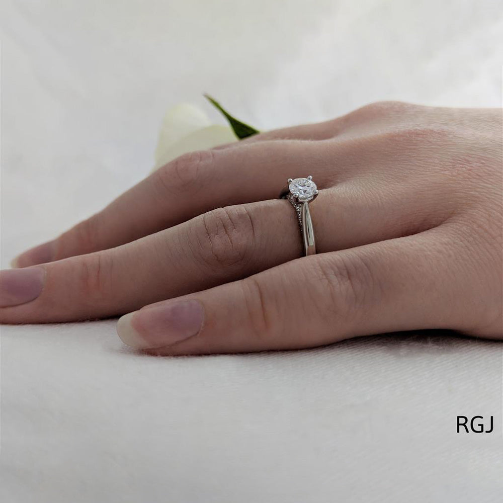 The Oxford Platinum 0.40ct Round Brilliant Cut Diamond Solitaire Engagement Ring With 0.07ct Diamond Detailing