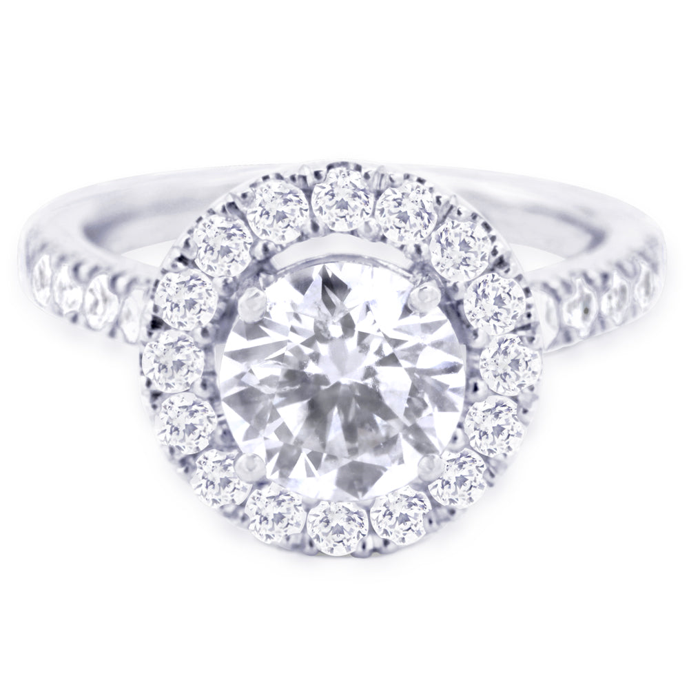 The Rosalia Platinum Round Brilliant Cut Diamond Engagement Ring With Diamond Halo And Diamond Set Shoulders