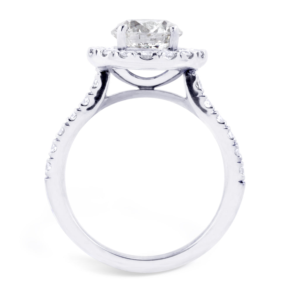 The Rosalia Platinum Round Brilliant Cut Diamond Engagement Ring With Diamond Halo And Diamond Set Shoulders