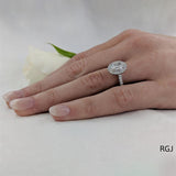 The Skye Platinum 0.91ct Oval Cut Diamond Engagement Ring With 0.39ct Diamond Halo And Diamond Set Shoulders