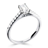 The Laurel Platinum 0.60ct Emerald Cut Diamond Solitaire Engagement Ring With 0.18ct Diamond Set Shoulders