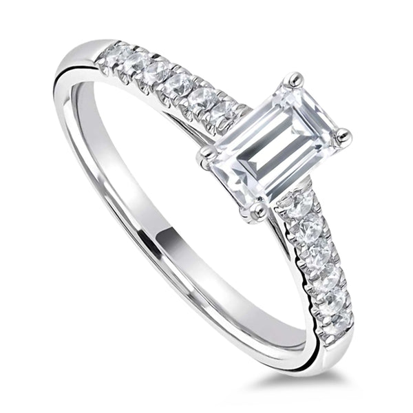 The Laurel Platinum 0.60ct Emerald Cut Diamond Solitaire Engagement Ring With 0.18ct Diamond Set Shoulders
