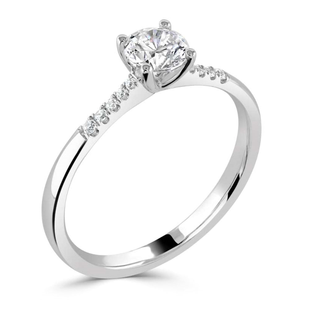 The Primula Platinum 0.30ct Round Brilliant Cut Diamond Solitaire Engagement Ring With 0.05ct Diamond Set Shoulders