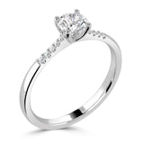 The Primula Platinum 0.30ct Round Brilliant Cut Diamond Solitaire Engagement Ring With 0.05ct Diamond Set Shoulders