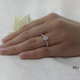 The Skye Classic Platinum 0.50ct Oval Cut Diamond Solitaire Engagement Ring With 0.20ct Diamond Set Shoulders