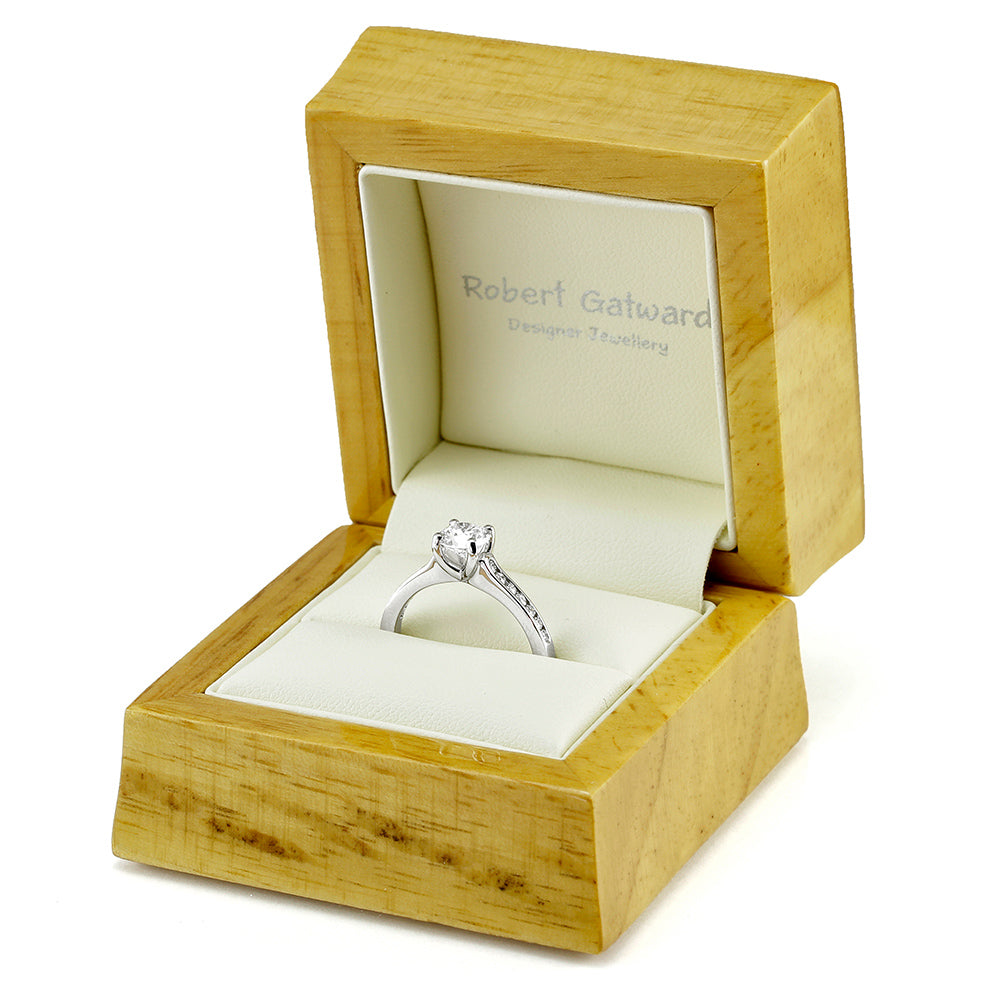 The Waterlily Platinum 0.50ct Round Brilliant Cut Diamond Solitaire Engagement Ring With 0.21ct Diamond Set Shoulders