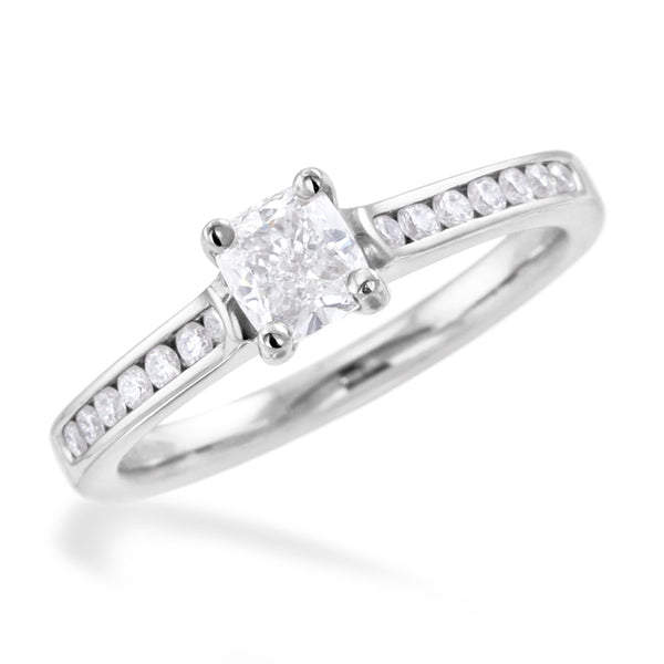 The Waterlily Platinum Cushion Cut Diamond Solitaire Engagement Ring With Diamond Set Shoulders