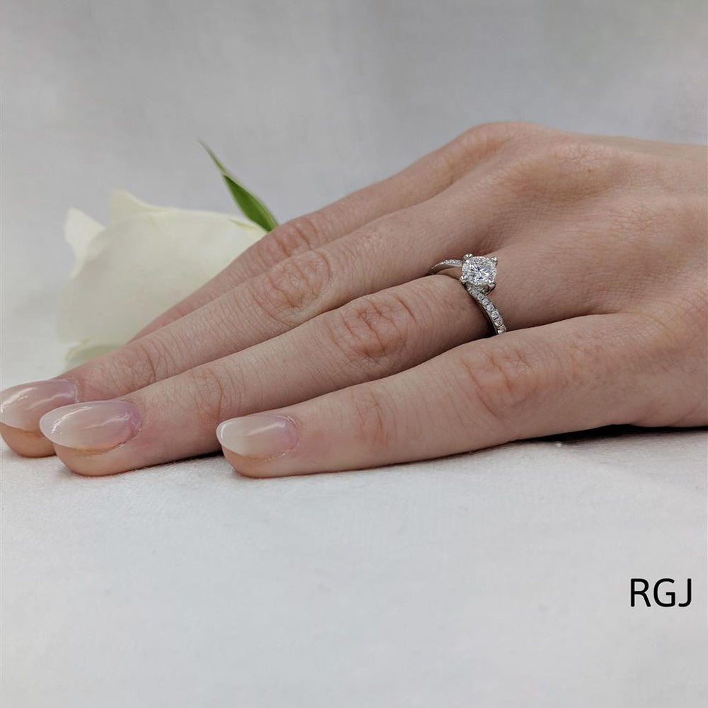 The Dursey Platinum 0.50ct Round Brilliant Cut Diamond Solitaire Engagement Ring With 0.21ct Diamond Set Shoulders