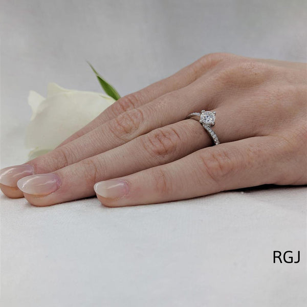 The Dursey Platinum 0.50ct Round Brilliant Cut Diamond Solitaire Engagement Ring With 0.21ct Diamond Set Shoulders