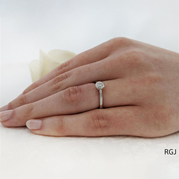 The Alena Platinum 0.50ct Round Brilliant Cut Diamond Solitaire Engagement Ring With 0.02ct Diamond Detailing