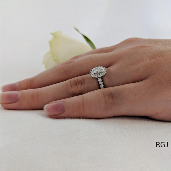 The Skye Platinum 0.40ct Oval Cut Diamond Engagement Ring With 0.31ct Diamond Halo And Diamond Set Shoulders