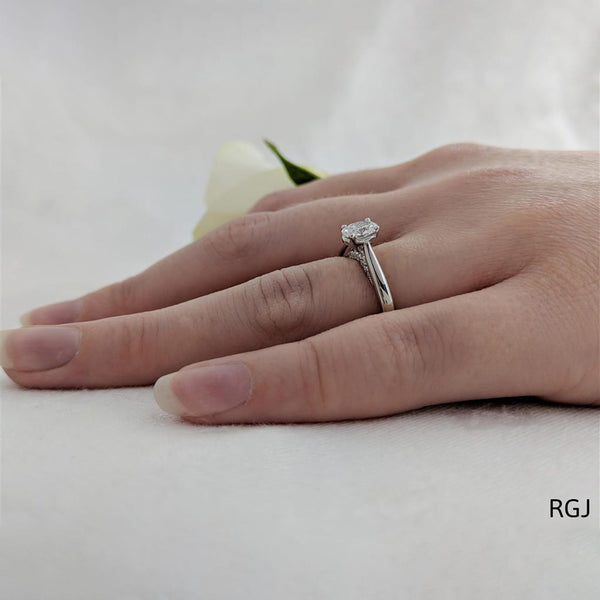 The Oxford Platinum 0.50ct Oval Cut Diamond Solitaire Engagement Ring With 0.07ct Diamond Detailing