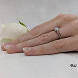 The Open Tulip Platinum 0.65ct Round Brilliant Cut Diamond Solitaire Engagement Ring