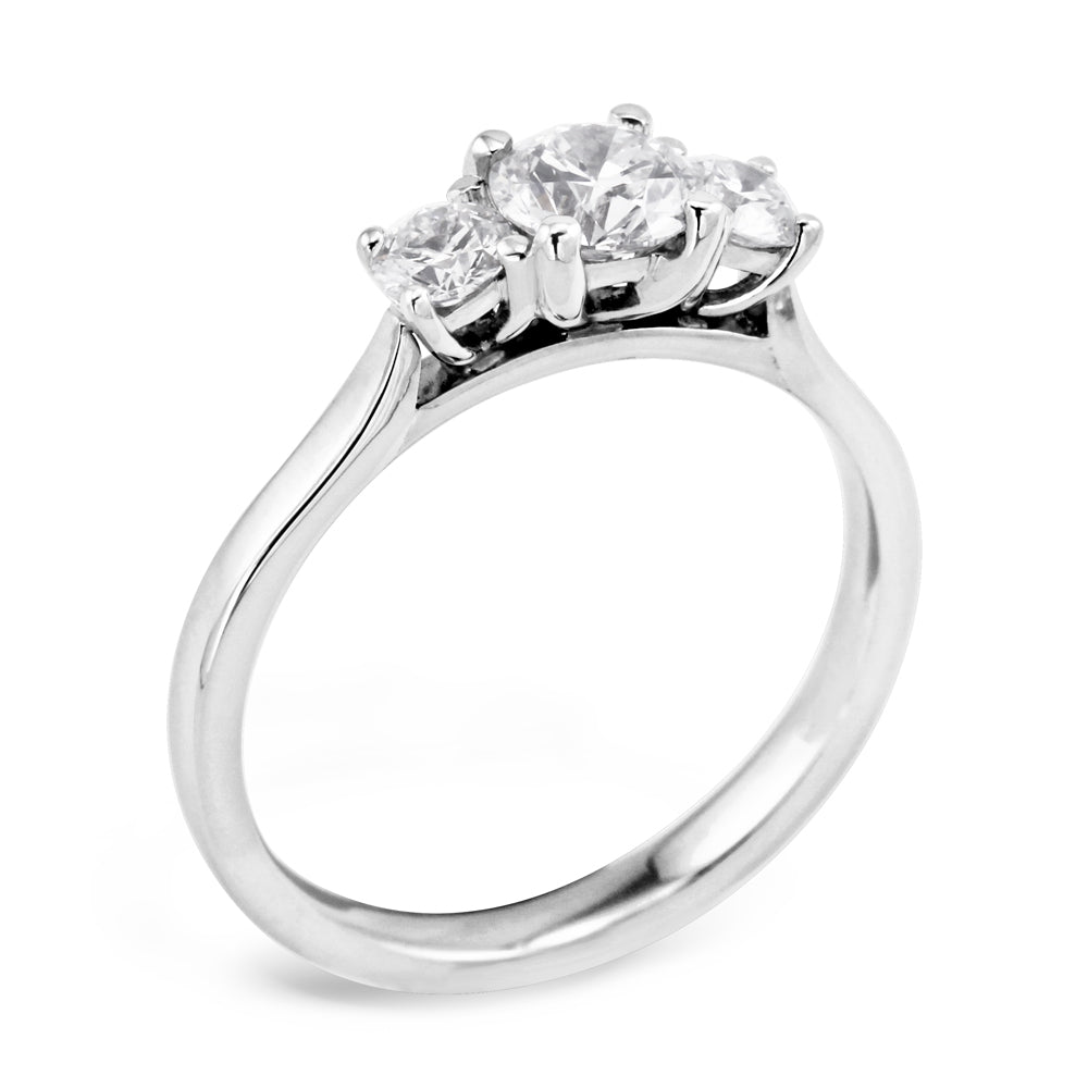 The Camellia Platinum Round Brilliant Cut Diamond Three Stone Engagement Ring