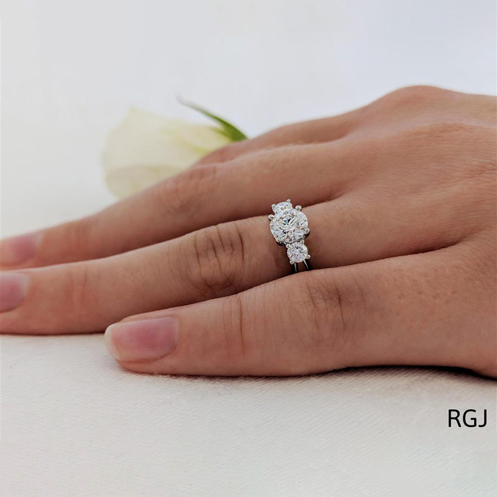 The Aldany Platinum 0.96ct Round Brilliant Cut Diamond Three Stone Engagement Ring