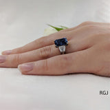 The Florentine Platinum 3.32ct Emerald Cut Blue Sapphire And 0.63ct Tapered Diamond Three Stone Ring