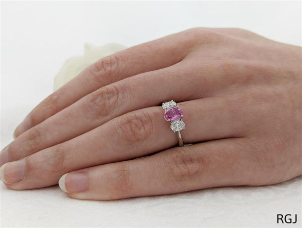 The Florentina Platinum 1.15ct Pink Sapphire And 0.66ct Diamond Oval Cut Three Stone Ring