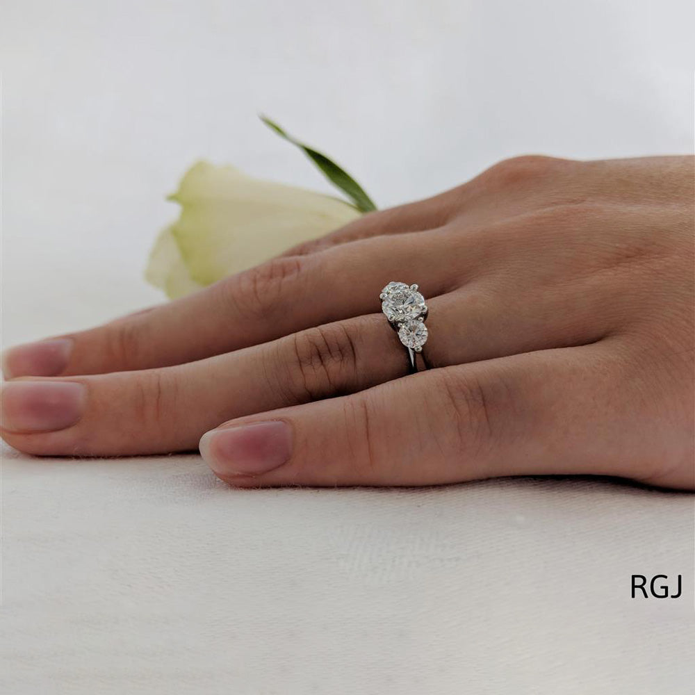 The Tulip Platinum 1.10ct Round Brilliant Cut Diamond Three Stone Engagement Ring