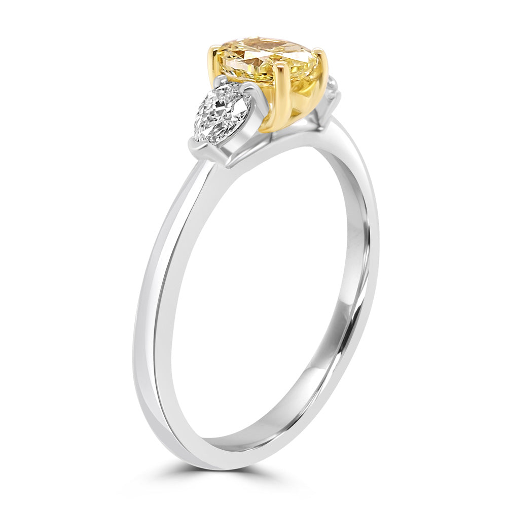 Platinum 1.02ct Oval Cut Yellow Diamond And 0.25ct Pear Cut Diamond Three Stone Ring