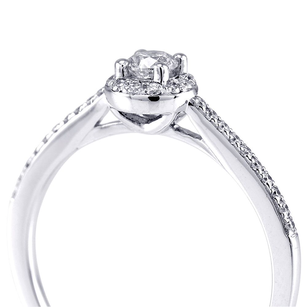 The Buttercup Platinum 0.10ct Round Brilliant Cut Diamond Halo Engagement Ring With 0.15ct Diamond Set Shoulders