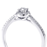 The Buttercup Platinum 0.10ct Round Brilliant Cut Diamond Halo Engagement Ring With 0.15ct Diamond Set Shoulders