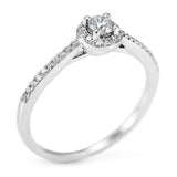 The Buttercup Platinum 0.10ct Round Brilliant Cut Diamond Halo Engagement Ring With 0.15ct Diamond Set Shoulders