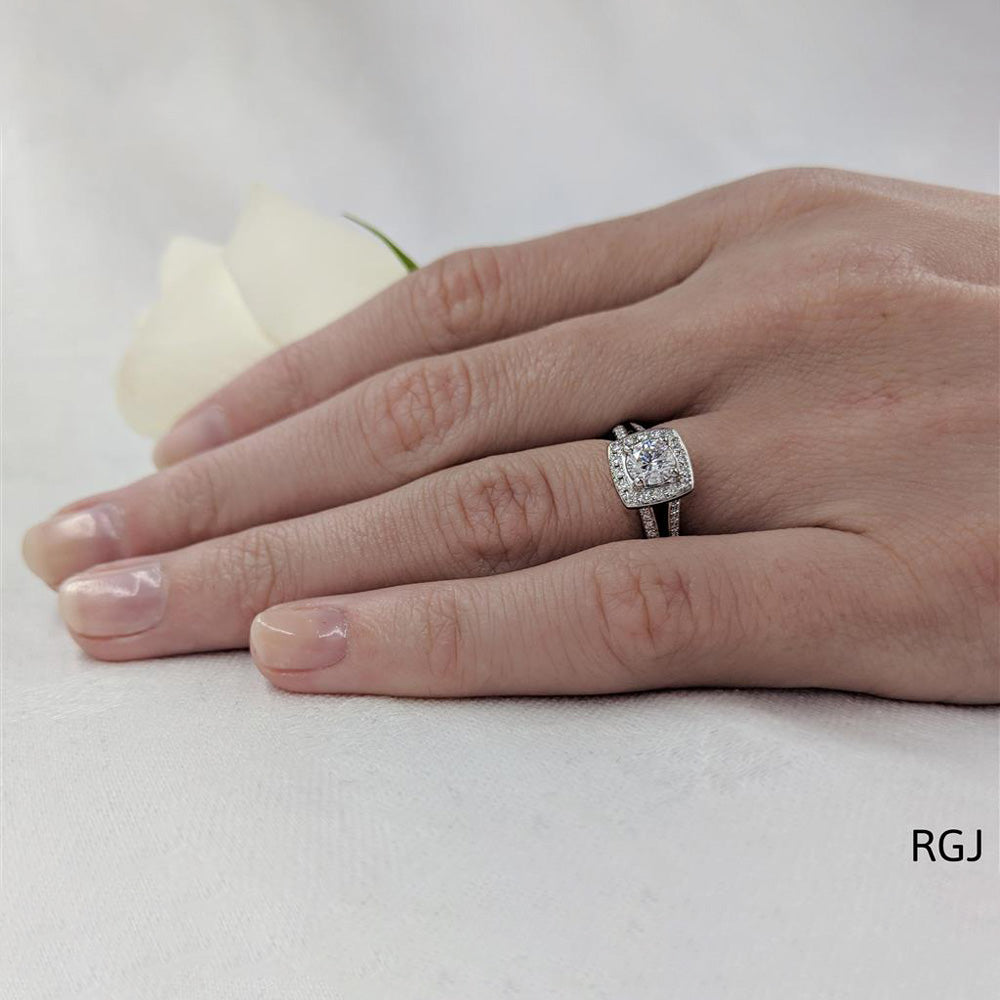 The Saturn Platinum 0.41ct Round Brilliant Cut Diamond Engagement Ring With 0.20ct Diamond Halo And Diamond Set Split Shoulders