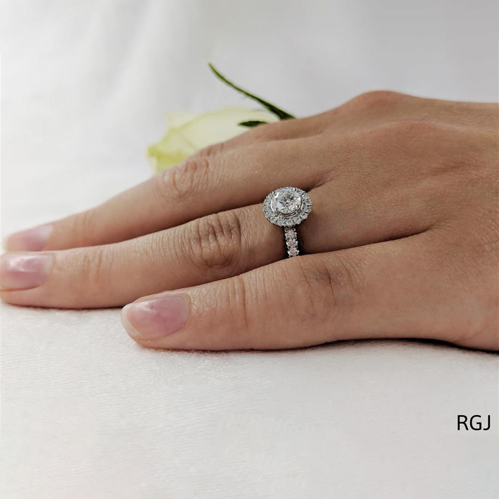 The Skye Platinum 0.51ct Round Brilliant Cut Diamond Engagement Ring With 0.28ct Diamond Halo And Diamond Set Shoulders