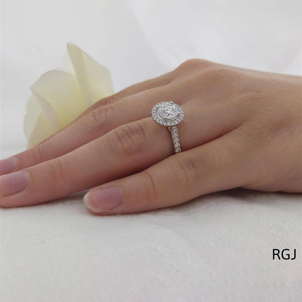 The Skye Platinum 1.01ct Round Brilliant Cut Diamond Engagement Ring With 0.31ct Diamond Halo And Diamond Set Shoulders