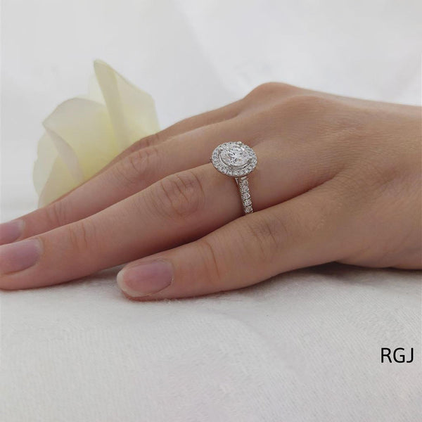 The Skye Platinum 1.01ct Round Brilliant Cut Diamond Engagement Ring With 0.31ct Diamond Halo And Diamond Set Shoulders