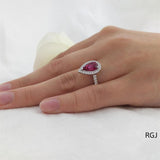 The Skye Platinum 1.49ct Pear Cut Pink Tourmaline Ring With 0.43ct Diamond Halo And Diamond Set Shoulders