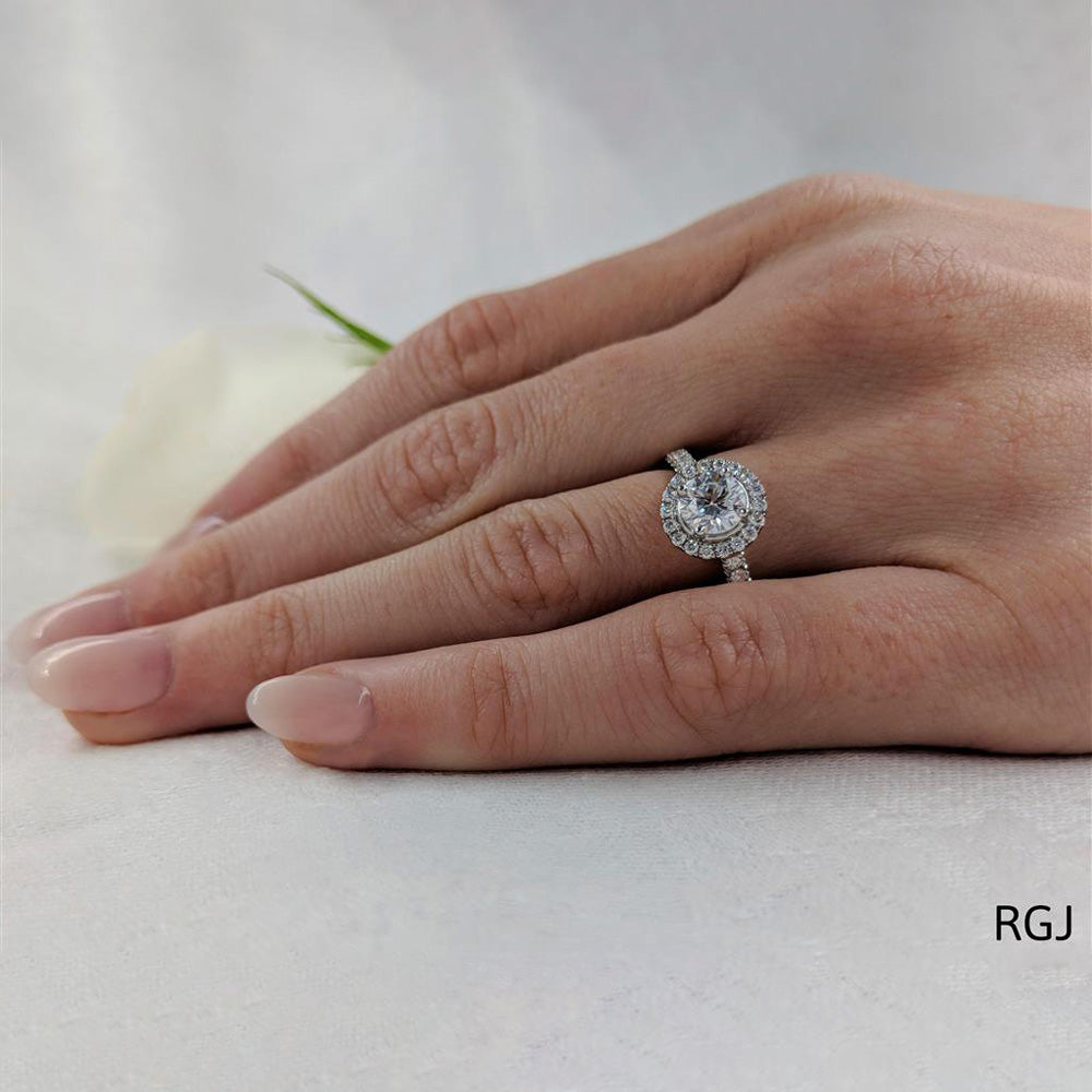 The Skye Platinum 0.71ct Round Brilliant Cut Diamond Engagement Ring With 0.37ct Diamond Halo And Diamond Set Shoulders