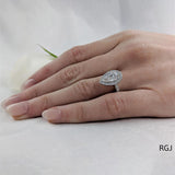 The Skye Platinum 1.53ct Pear Cut Diamond Engagement Ring With 0.42ct Diamond Halo And Diamond Set Shoulders
