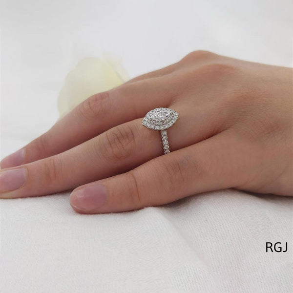 The Skye Platinum 0.38ct Marquise Cut Diamond Engagement Ring With 0.41ct Double Diamond Halo And Diamond Set Shoulders