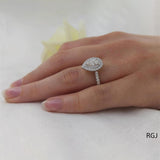The Skye Duo Platinum 0.52ct Pear Cut Diamond Engagement Ring With 0.52ct Double Diamond Halo And Diamond Set Shoulders