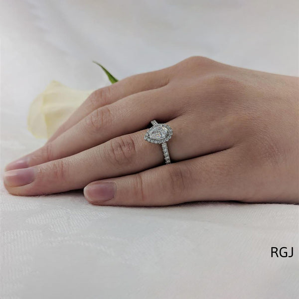 The Skye Platinum 0.44ct Pear Cut Diamond Engagement Ring With 0.33ct Diamond Halo And Diamond Set Shoulders