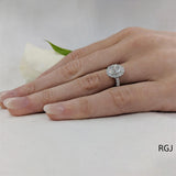 The Skye Platinum 0.50ct Oval Cut Diamond Engagement Ring with 0.33ct Diamond Halo And Diamond Set Shoulders