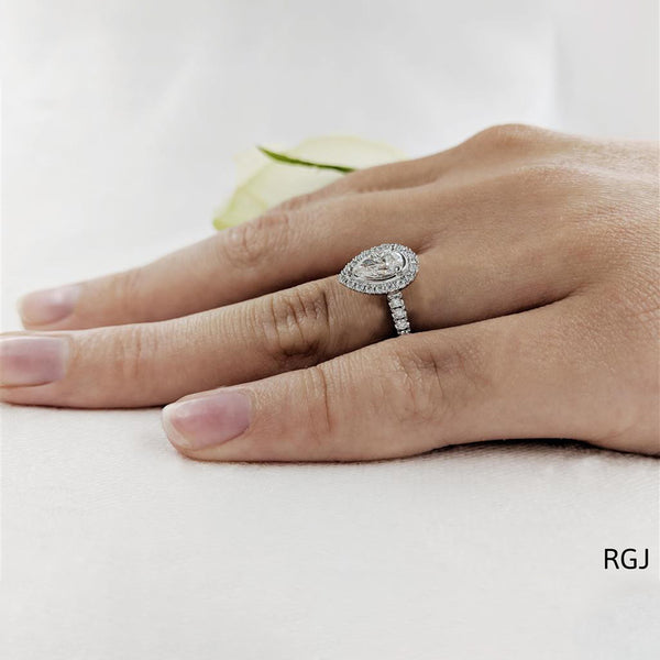 The Skye Platinum 0.50ct Pear Cut Diamond Engagement Ring With 0.33ct Diamond Halo And Diamond Set Shoulders