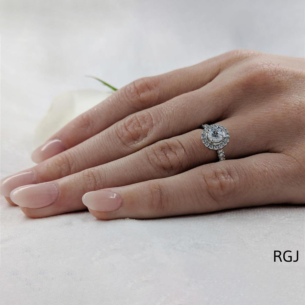 The Skye Platinum 0.50ct Round Brilliant Cut Diamond Engagement Ring With 0.31ct Diamond Halo And Diamond Set Shoulders